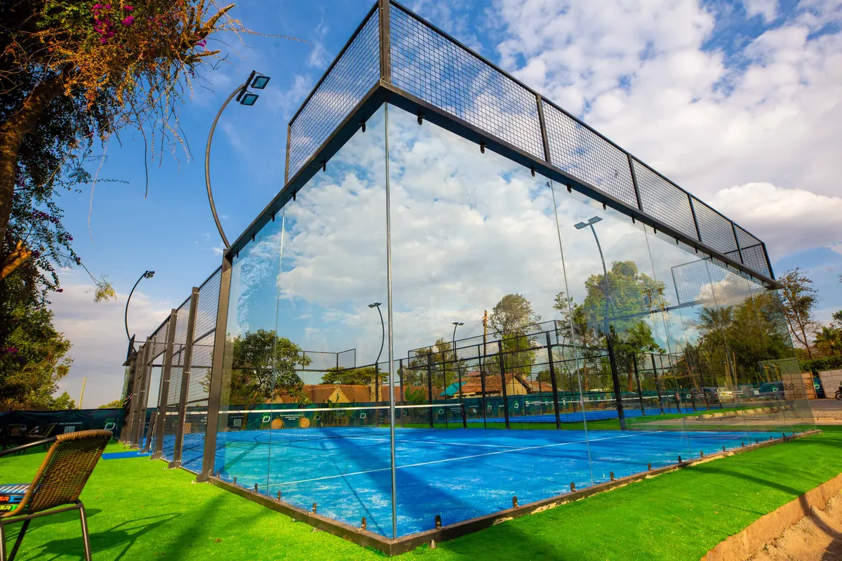 SD panoramic glass court with a green turf surround